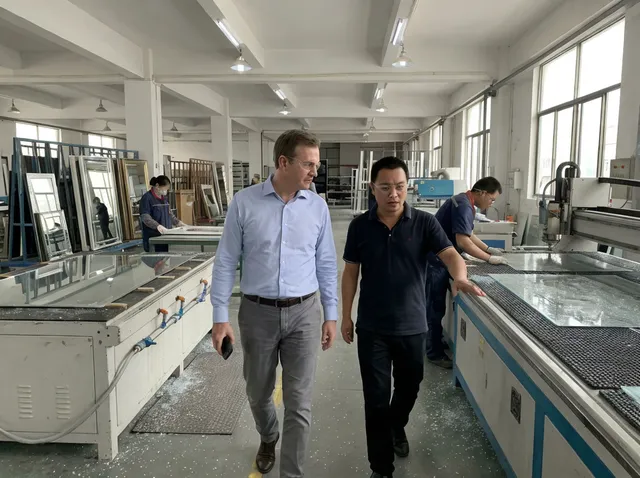 Buyer touring production floor during factory visit
