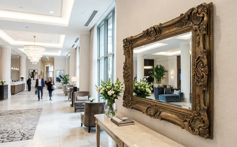 Ornate frame mirror in luxury hotel lobby interior