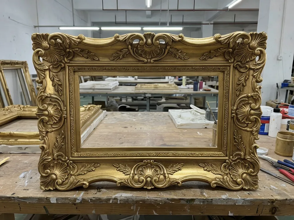 Resin-gilded ornate baroque gold mirror frame with carved detail