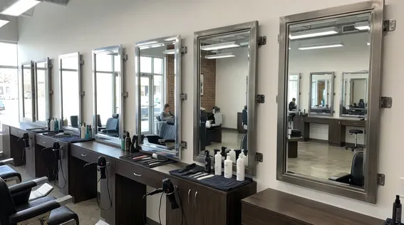 Chrome and pewter station mirrors in professional salon environment