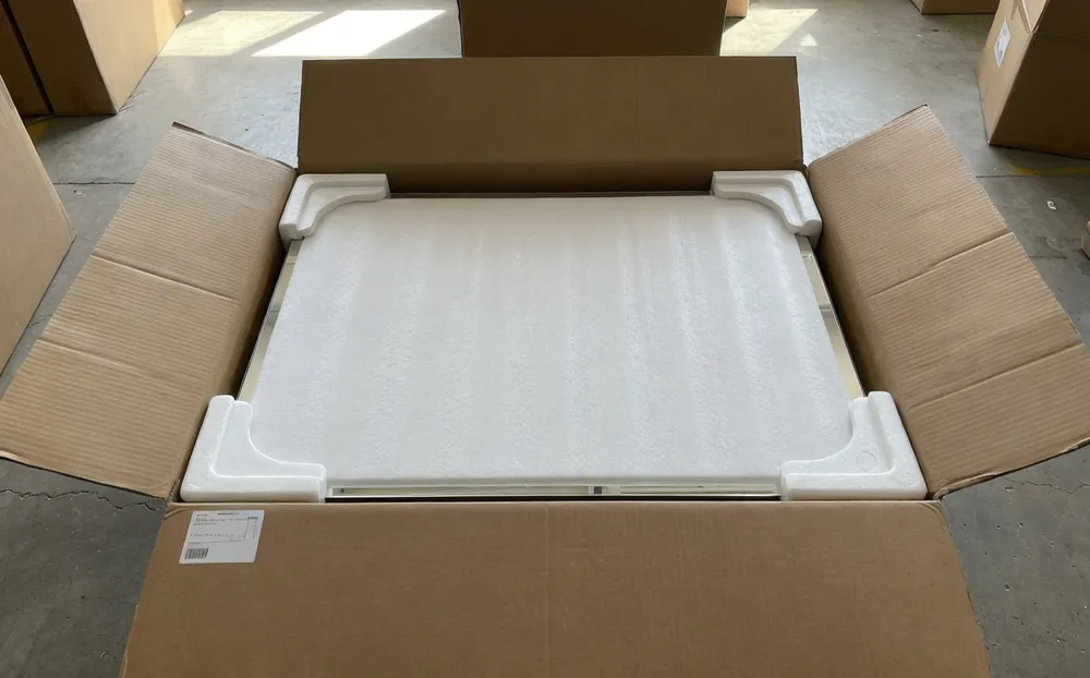 E-commerce mirror packaging with molded foam corners and protective foam sheet