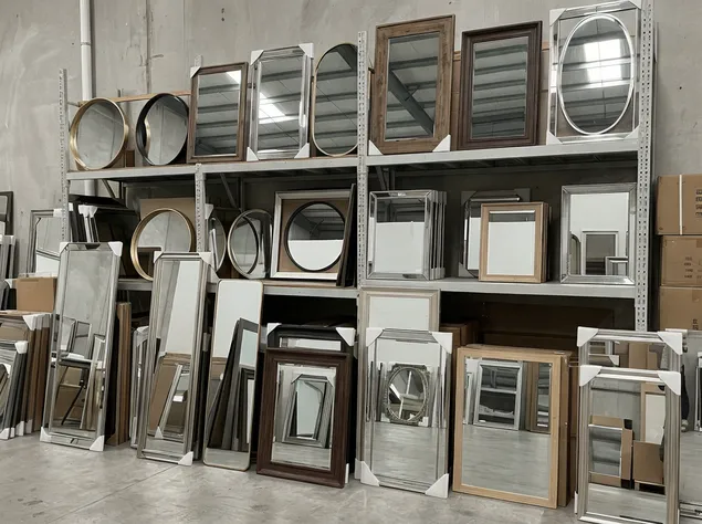 Assorted home decor mirrors in various frame styles for general retail