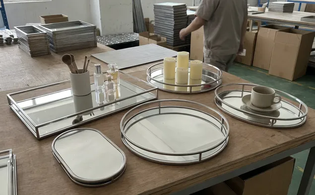 Mirrored decorative trays with raised rims for vanity and hospitality use