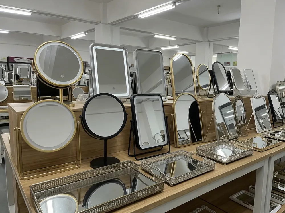 Collection of table decor mirrors including vanity mirrors, mirrored trays, and decorative standing mirrors