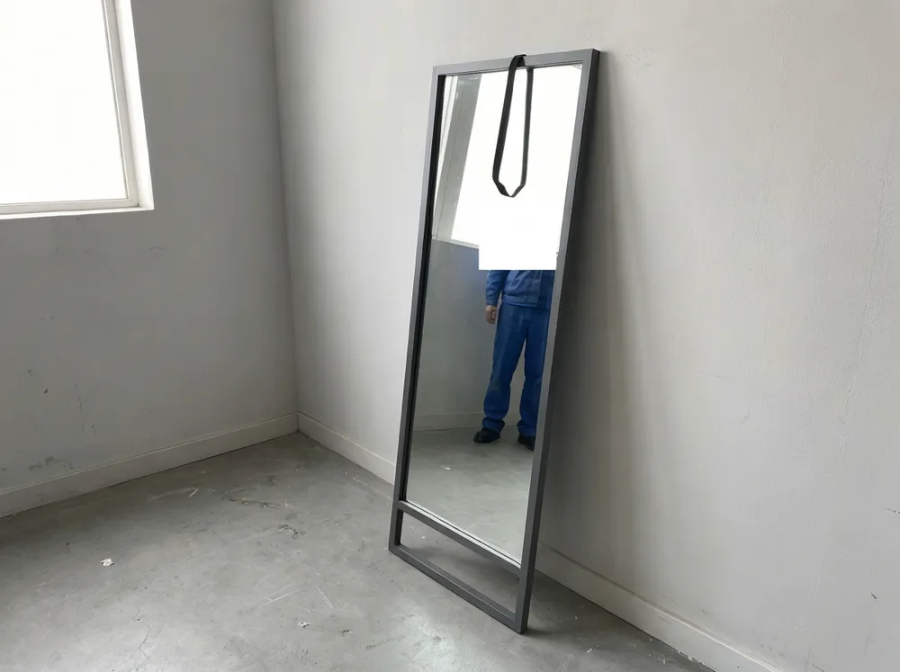 Leaning frame floor mirror showing optimal 5-8 degree lean angle against wall