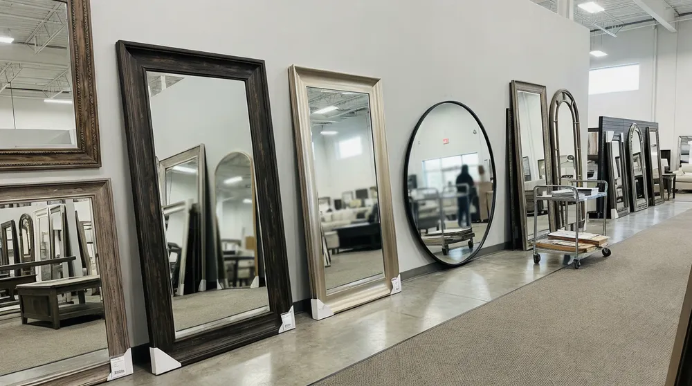 Large format mirrors displayed in wholesale showroom setting