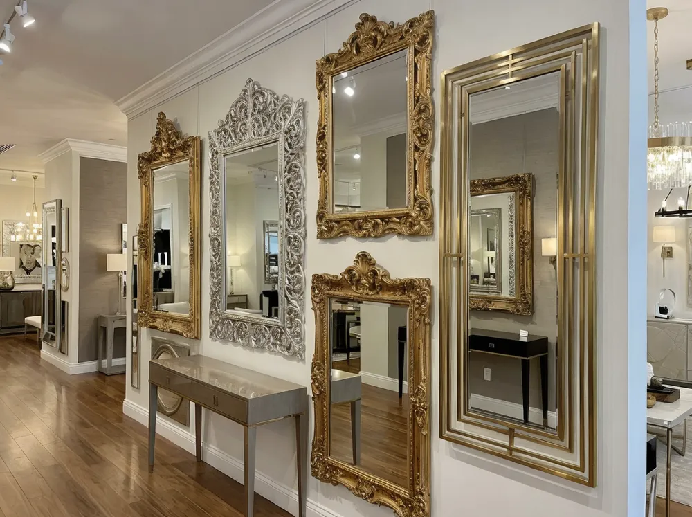 Luxury decor mirrors displayed in high-end retail showroom environment