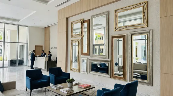 Custom decorative mirrors installed in hotel lobby interior design project
