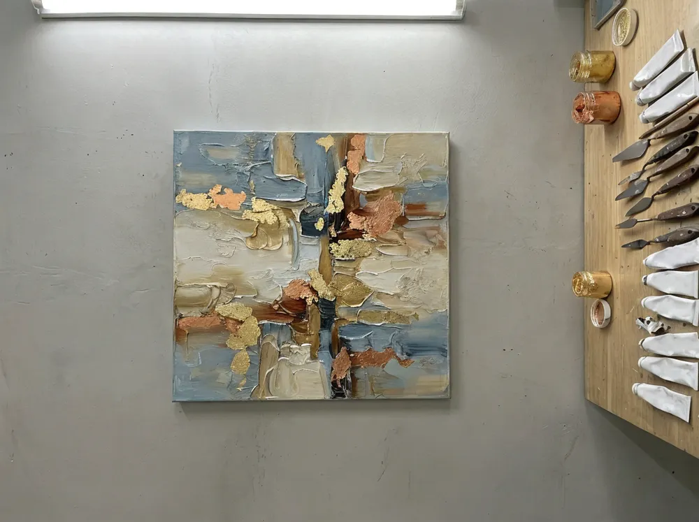 Hand-painted abstract canvas with heavy texture and metallic accents