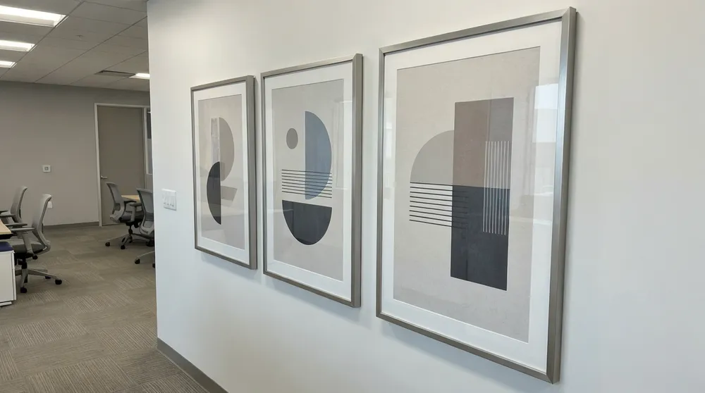 Office wall art with clean lines, neutral palettes, and professional metal framing