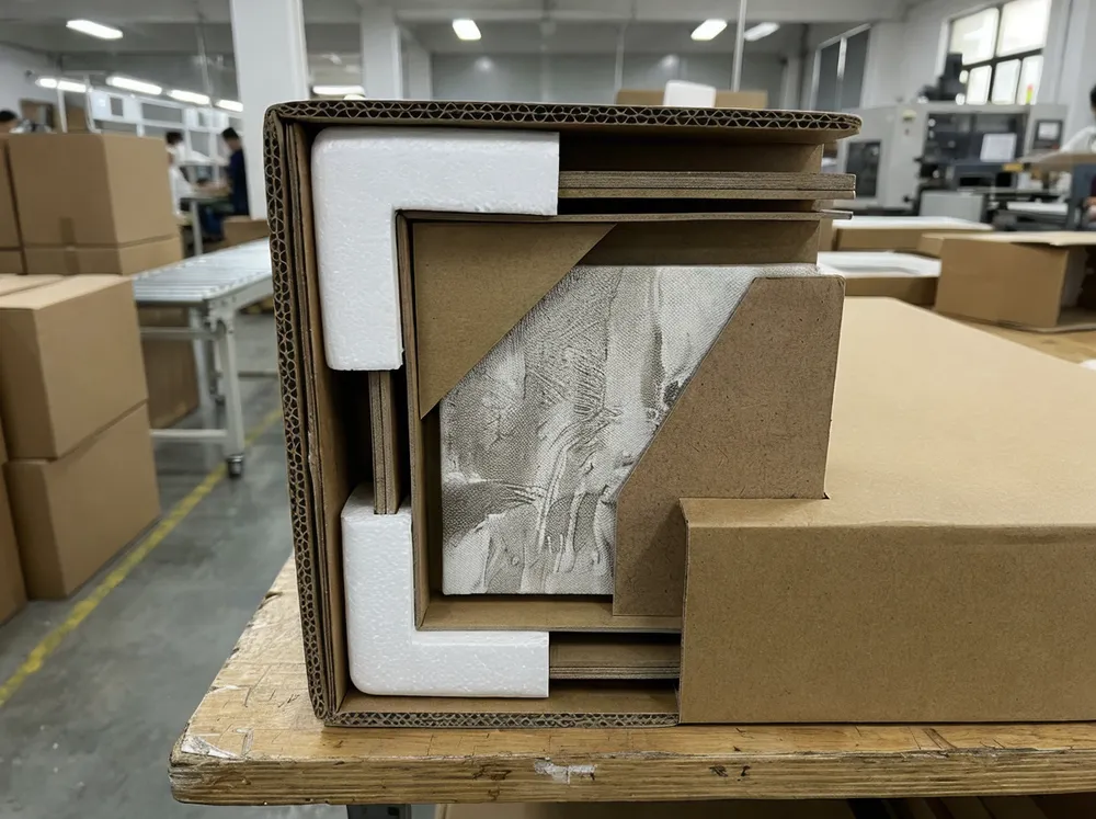 Cross-section view of protective packaging layers for living room wall art including foam corners and stiffener boards