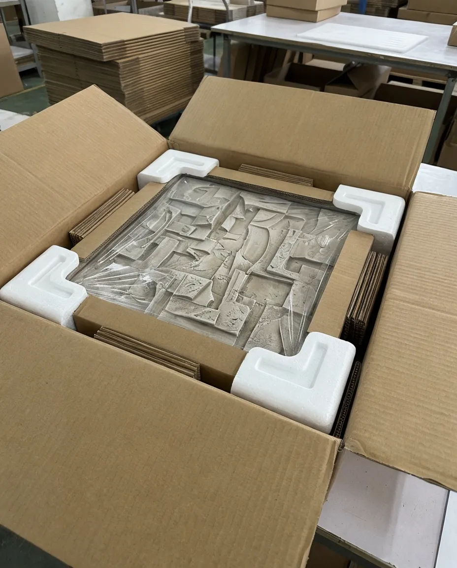 Packaging protection layers for dimensional wall art showing foam corners and cardboard spacers