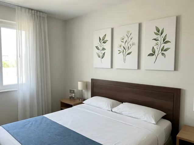 Botanical wall art installed in hotel guest room setting