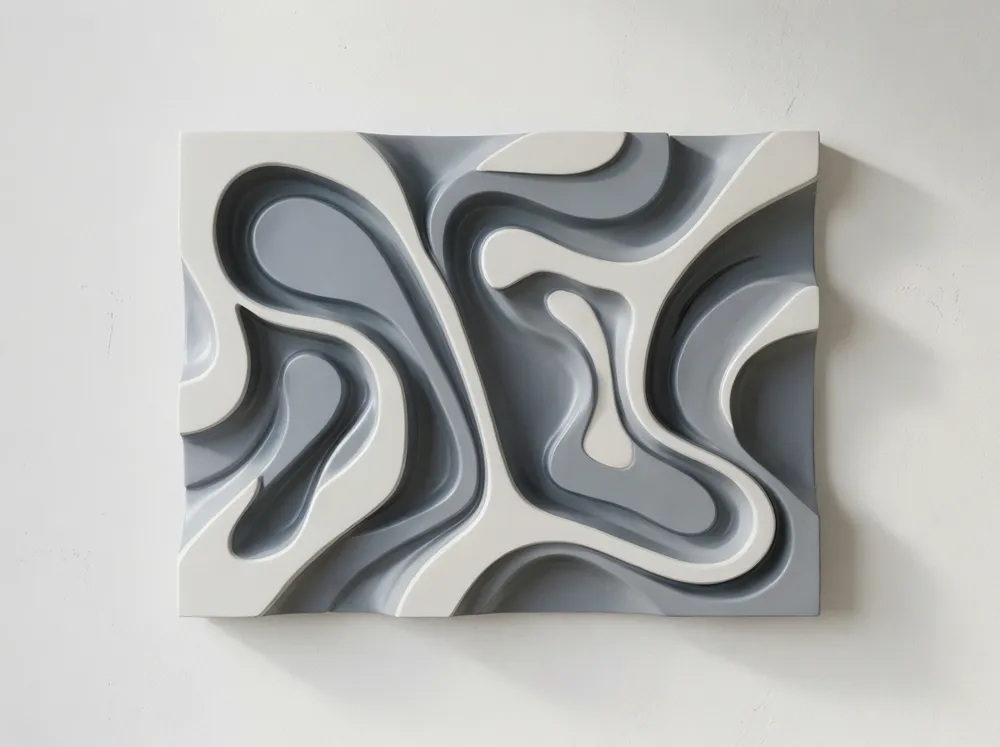 Resin wall sculpture product photography showing dimensional shadow depth