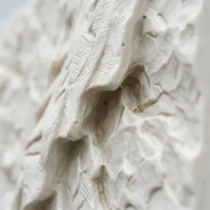 Close-up of resin sculpture surface texture and undercut detail