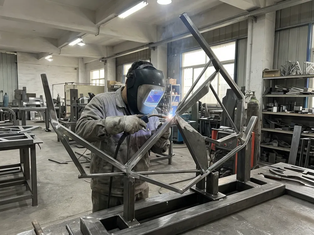 MIG welding process on mild steel wall sculpture with ground smooth joints